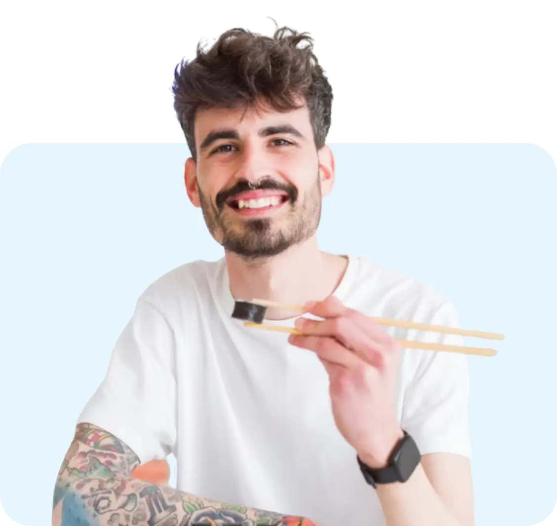 Man eating with chopsticks